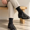 جوراب مردانه مشکی ساده ساقبلند روی پا جوراب مردانه مشکی ساده ساقبلند روی پا